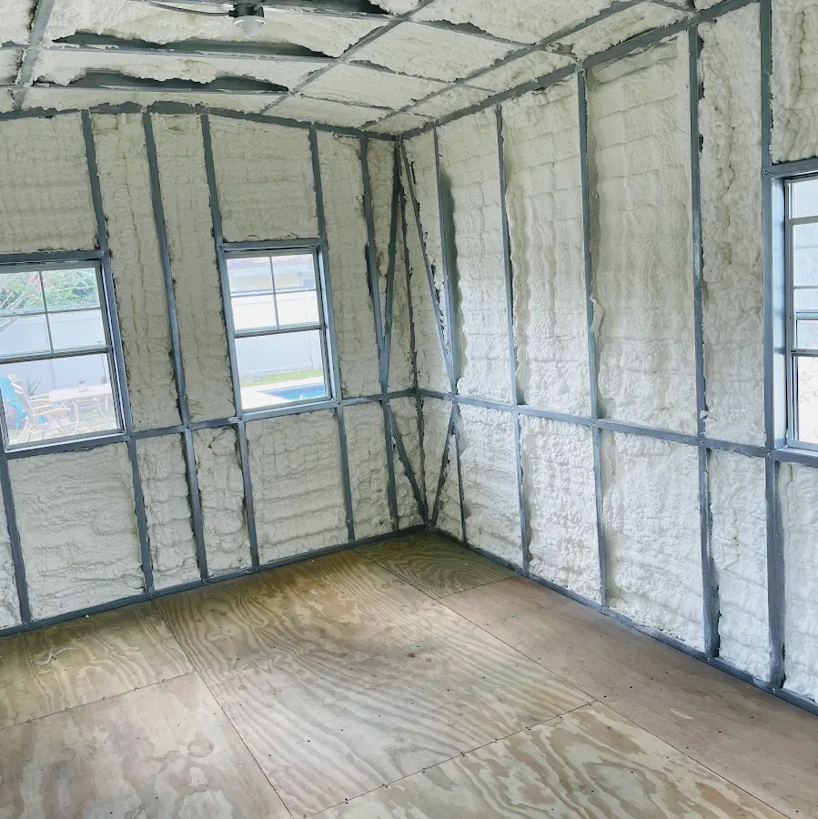 Closed-cell spray foam insulation applied to wall cavities in a residential project in Artondale